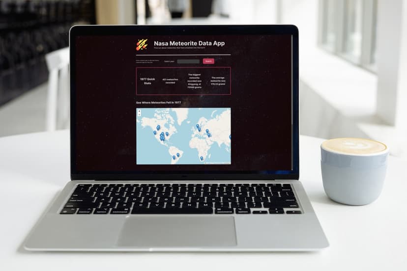 a laptop with a screenshot of my meteorite web app.